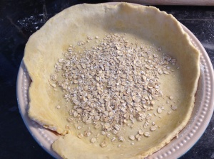 Sprinkle the oats over the pastry.